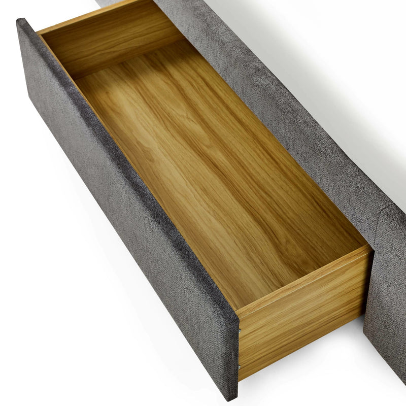 Gray upholstered bench with an open wooden storage compartment on a white background