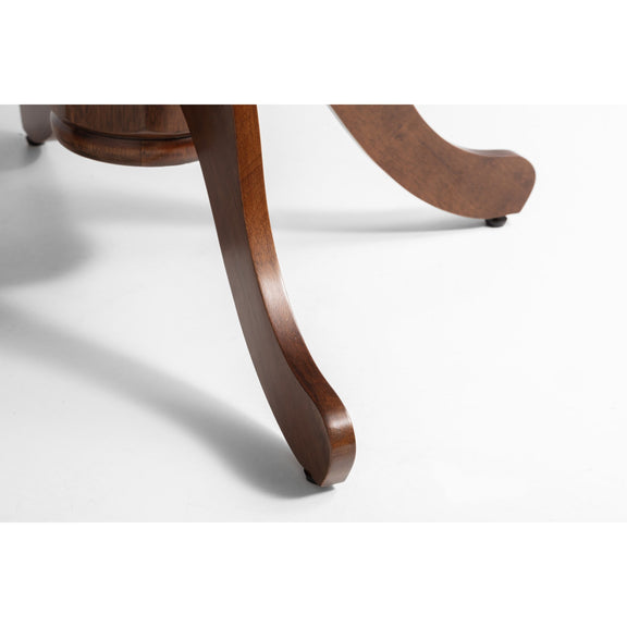 Close-up of a wooden chair leg on a white background