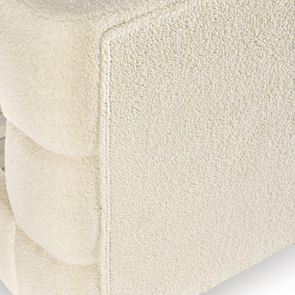 Close-up of a textured beige fabric surface