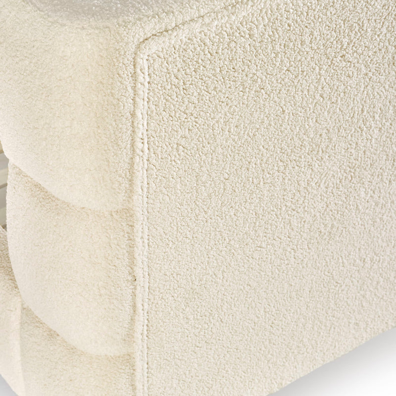 Close-up of a textured beige fabric surface