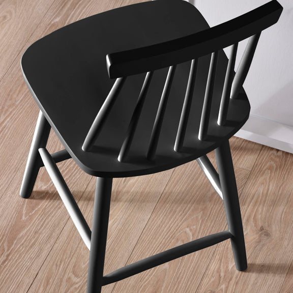 Black wooden chair on a wooden floor