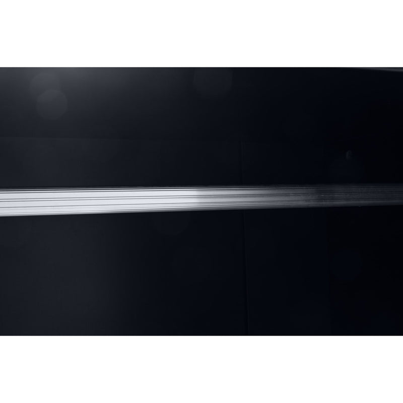 Close-up of a black surface with a silver strip