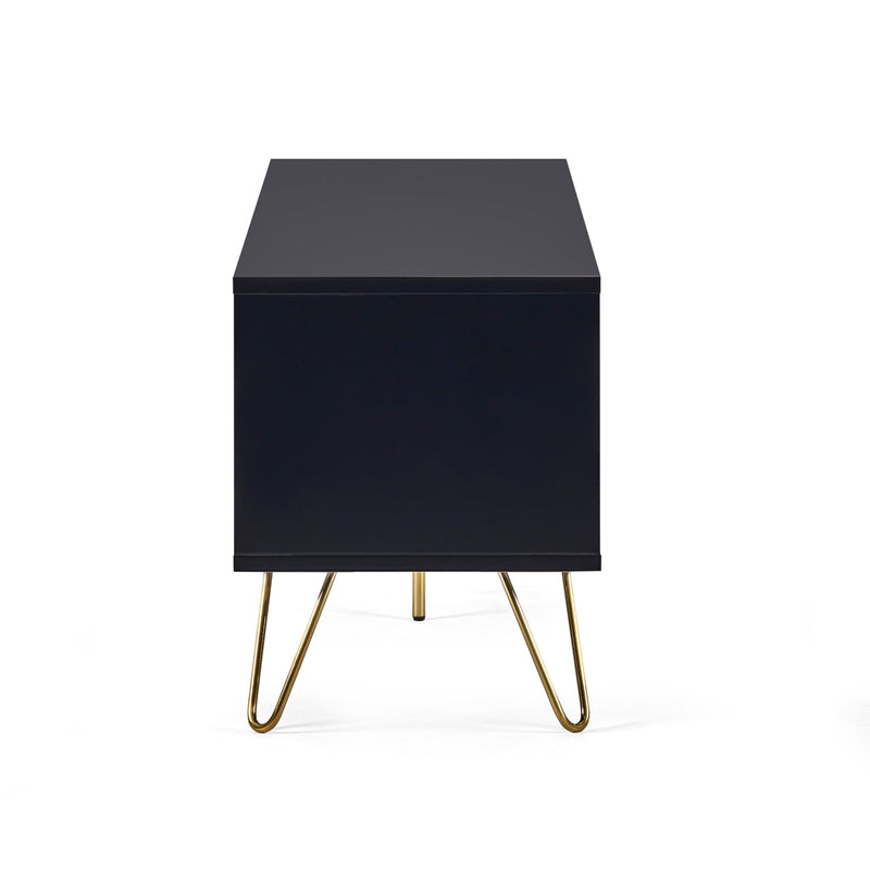 Black cube-shaped side table with gold hairpin legs on a white background