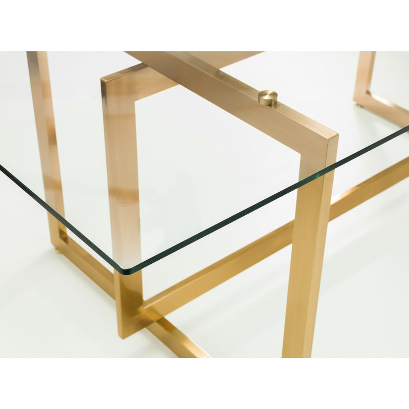Glass table with gold metal frame on a white background