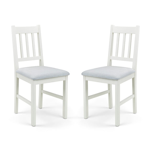 Two white chairs with light gray seats on a white background