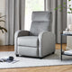 Gray recliner chair in a living room setting with curtains and a side table.