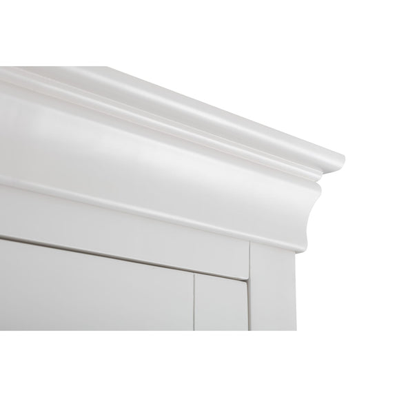 Close-up of a white crown molding on a white wall