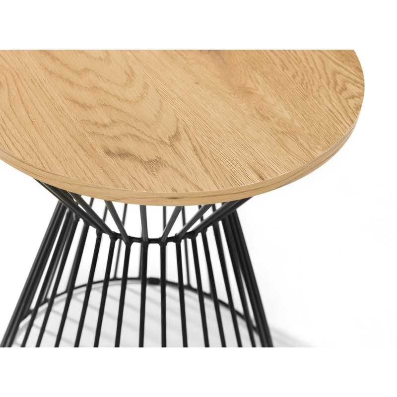 Round wooden table with black metal base on a white background