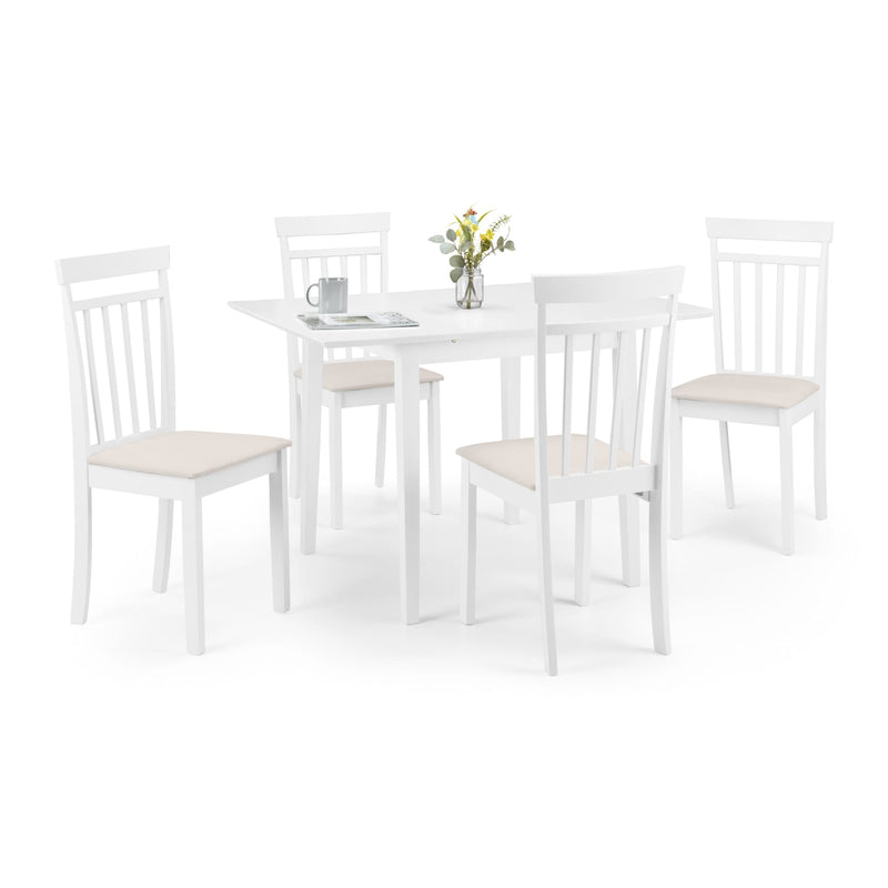 White dining table with four matching chairs on a white background