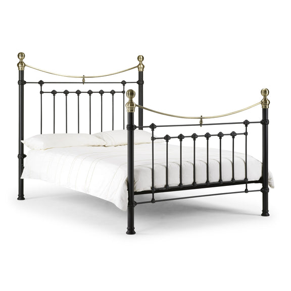 Black metal bed frame with gold accents on a white background
