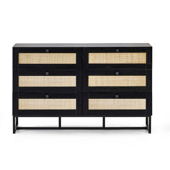 Black dresser with rattan accents on a white background