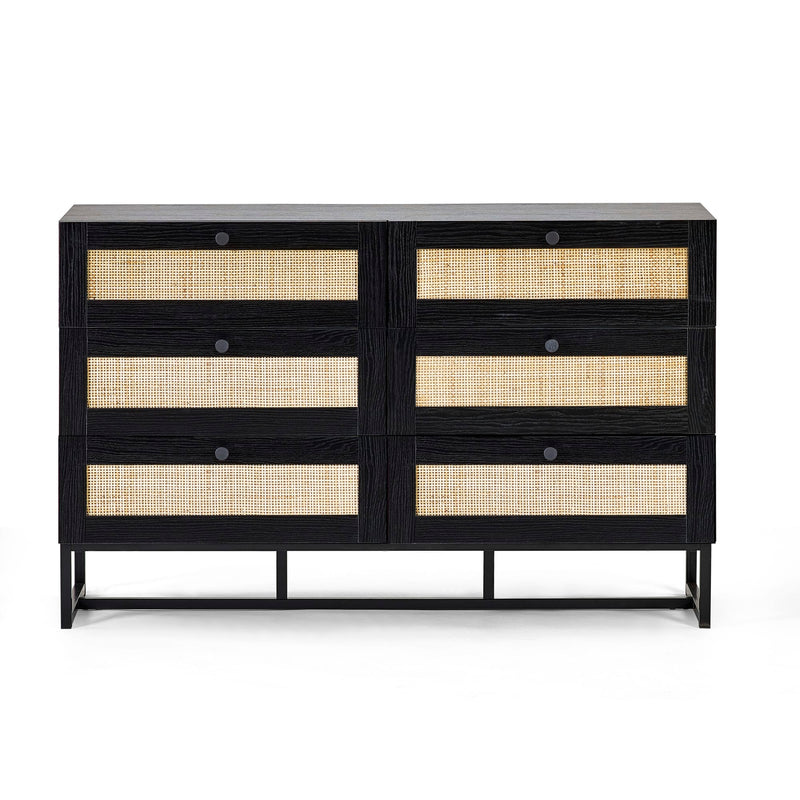 Black dresser with rattan accents on a white background
