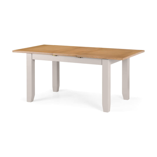 Wooden dining table with white base on a white background