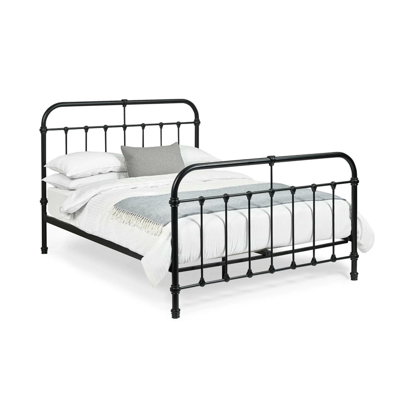 Black metal bed frame with white bedding on a white background