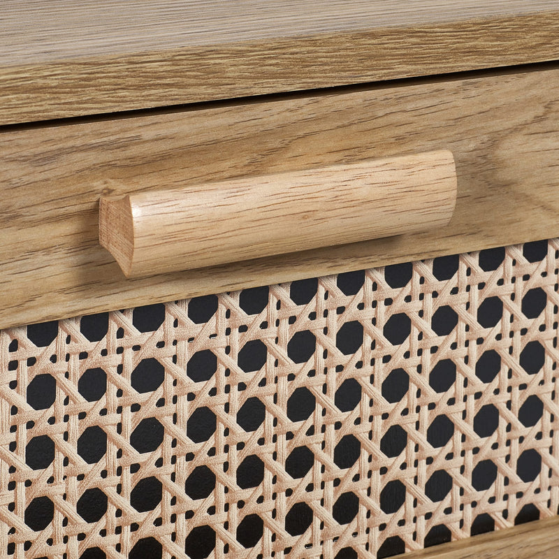 Wooden handle on a piece of furniture with wicker pattern
