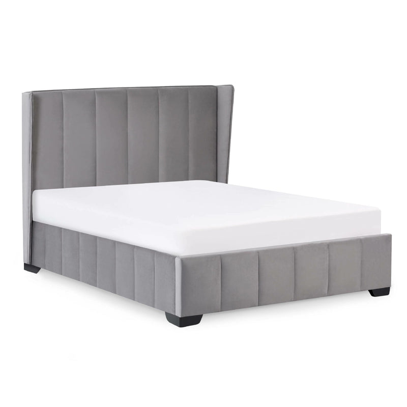 Gray upholstered bed with white mattress on a white background