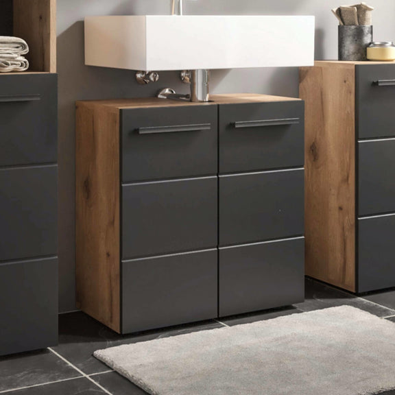 Bathroom vanity with wooden top and gray cabinets, featuring a sink and mirror.