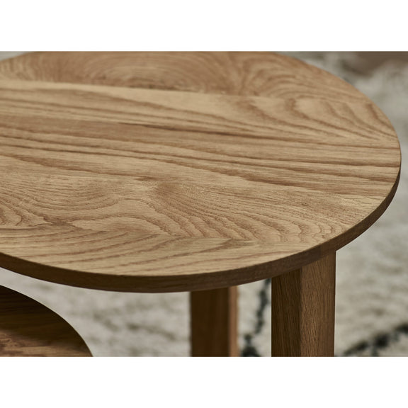Round wooden table with a blurred background