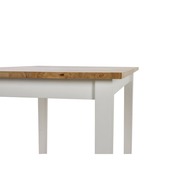 Wooden table with white base on a white background