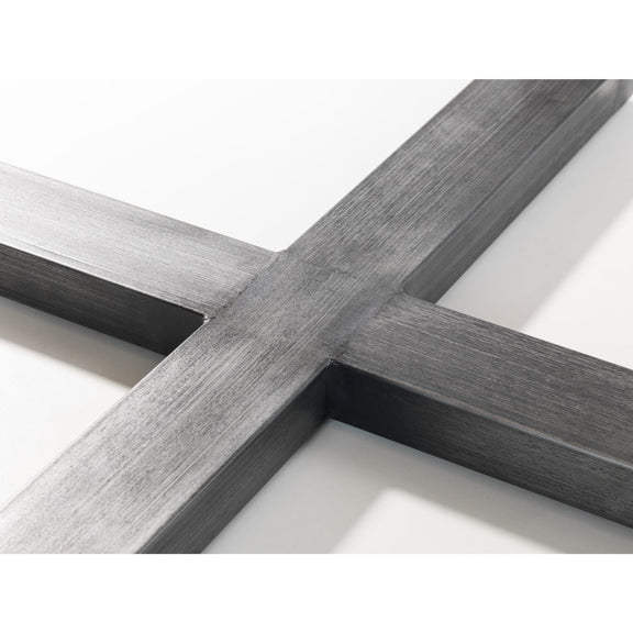 Close-up of a wooden frame with a cross-shaped design on a white background
