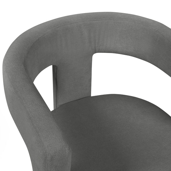 Gray chair with curved armrests on a white background