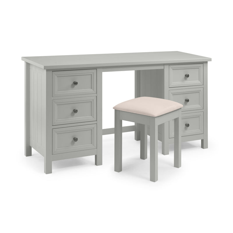 Gray desk with multiple drawers and a matching stool on a white background