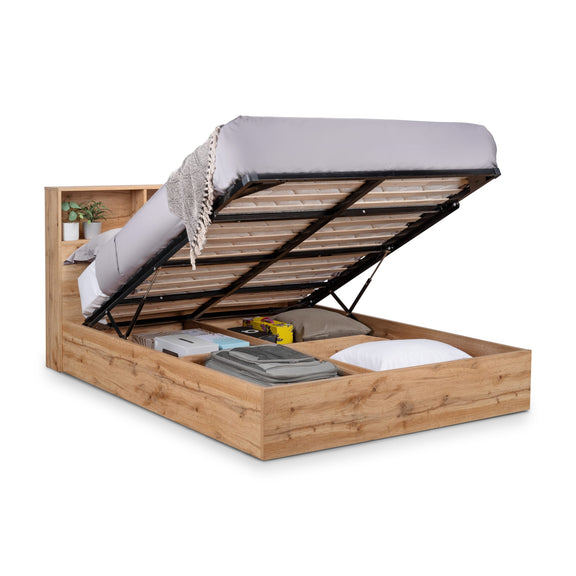 Wooden bed with storage compartments on a white background