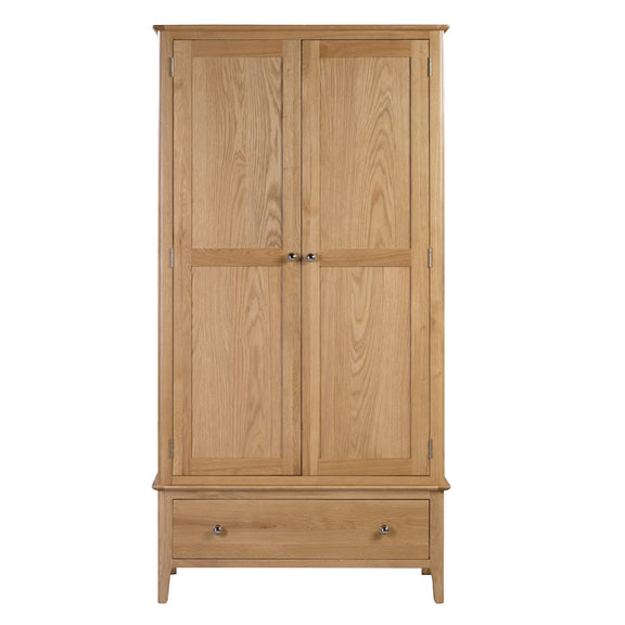 Wooden wardrobe with two doors and a drawer on a white background