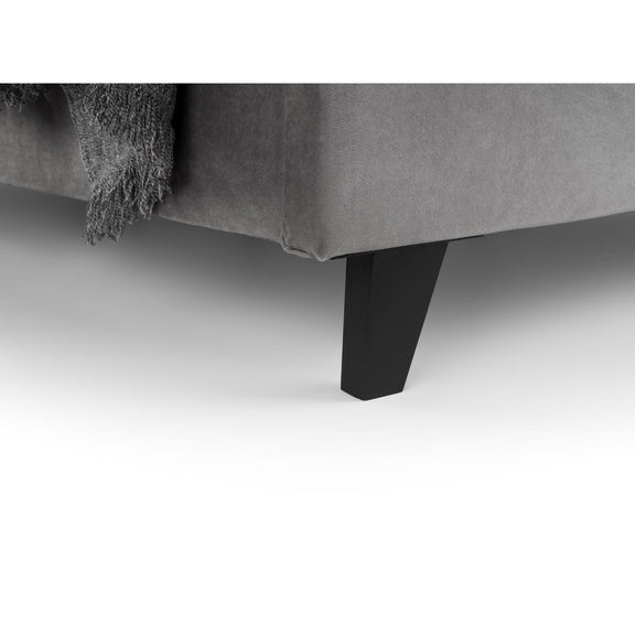 Gray upholstered chair with a black leg on a white background