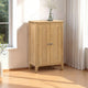 Wooden cabinet with two doors in a bright room with a window and white curtains.