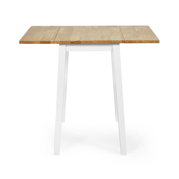 Wooden table with white legs on a white background