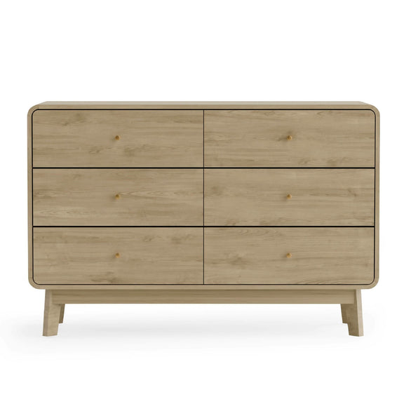 Wooden dresser with four drawers on a white background