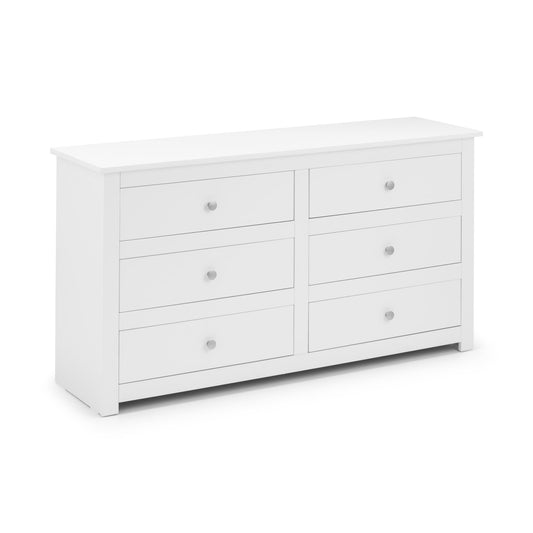 White dresser with multiple drawers on a white background
