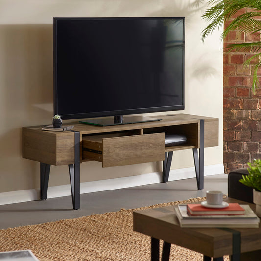 Wooden TV stand with a television mounted on a wall in a living room setting.