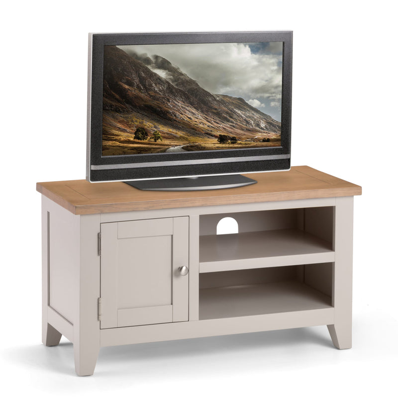 TV on a wooden stand with a scenic display on the screen