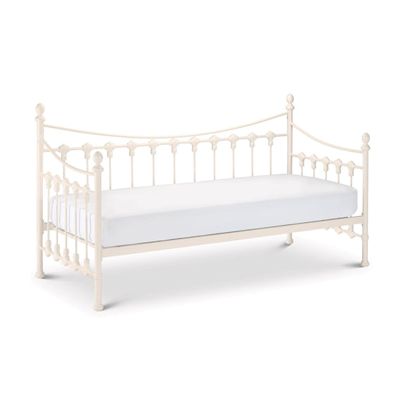 White metal bed frame with mattress on a white background