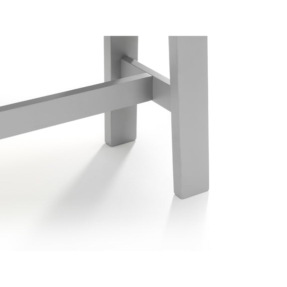 Close-up of a gray metal chair leg on a white background