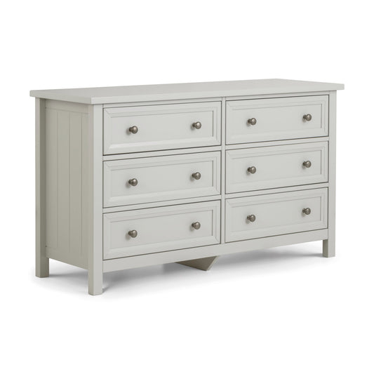 Light gray dresser with six drawers on a white background
