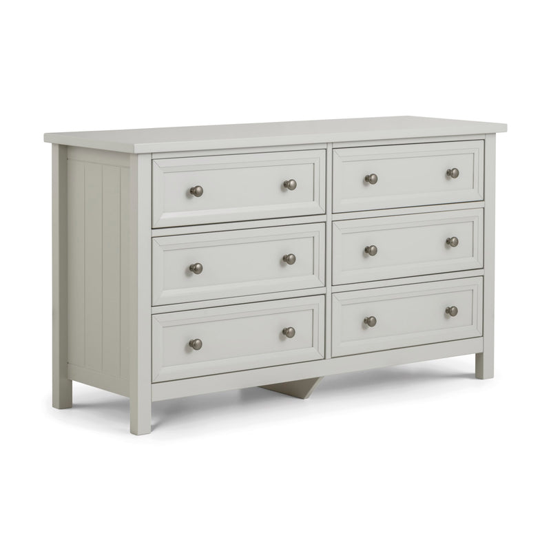 Light gray dresser with six drawers on a white background