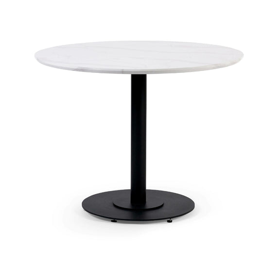 Round white table with a black base on a white background