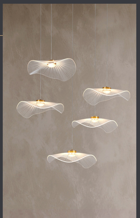 Gold leaf inspired staircase pendant light interior view