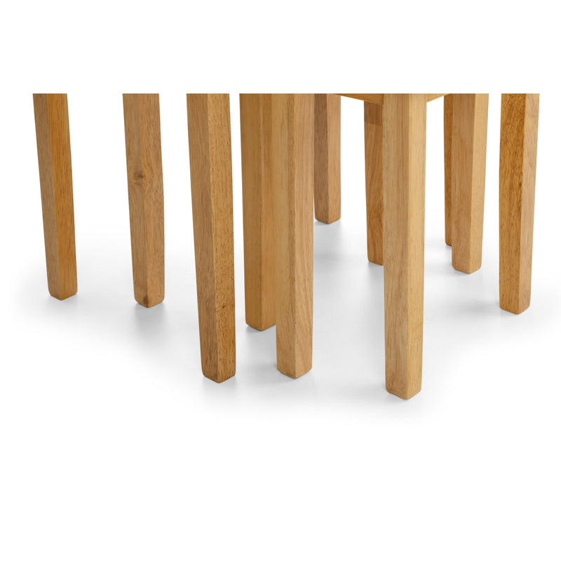 Close-up of wooden table legs on a white background