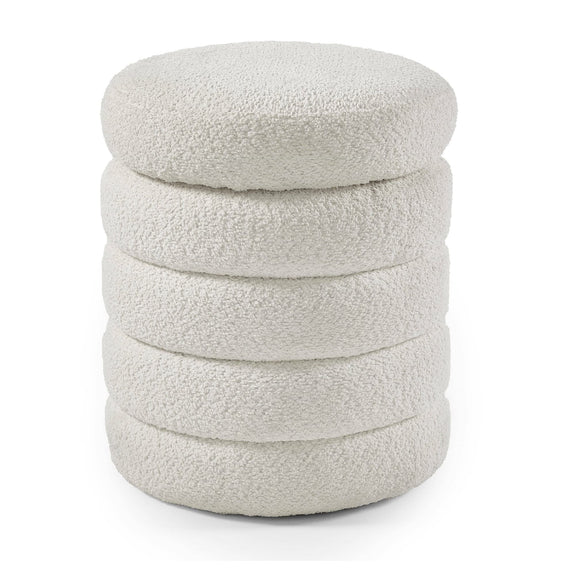 Stack of white textured cushions on a white background