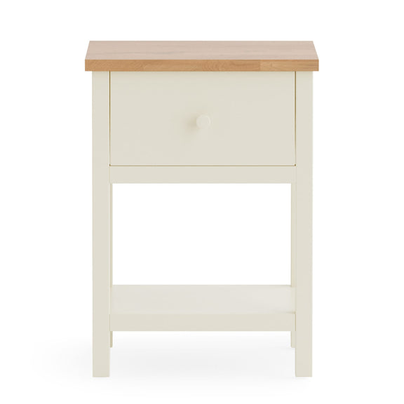 Small white cabinet with a wooden top on a white background