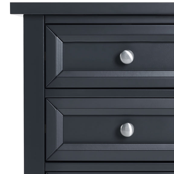 Close-up of a dark blue dresser with silver knobs on a white background