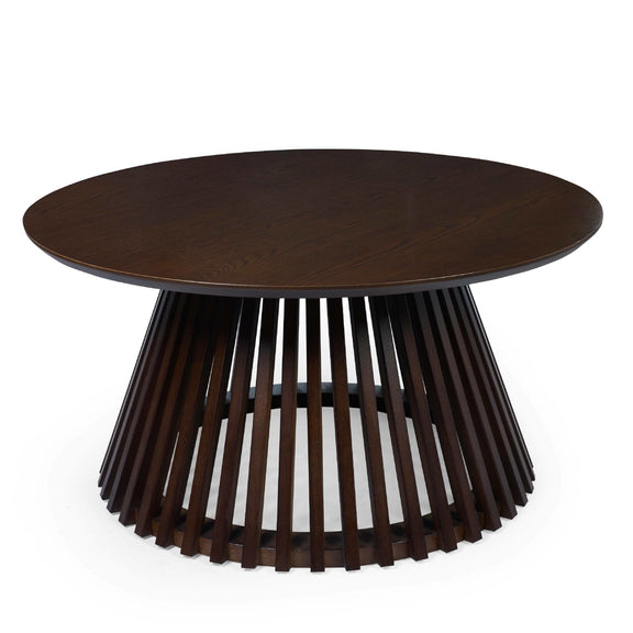 Wooden side table with a unique base design on a white background