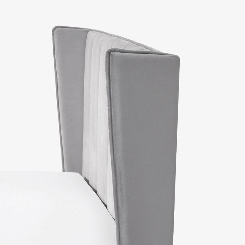 Gray upholstered headboard on a white background