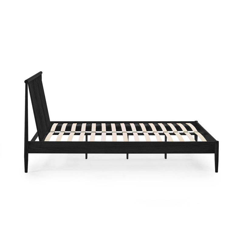 Black metal bed frame with wooden slats on a white background