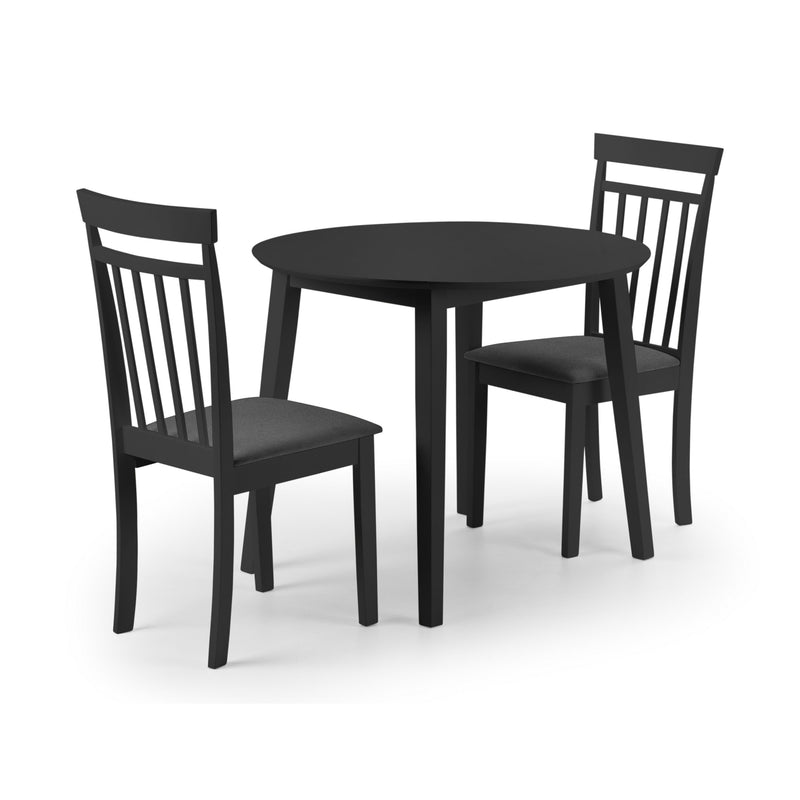 Black round table with two matching chairs on a white background
