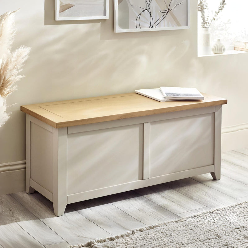 Wooden bench with storage compartments in a room setting
